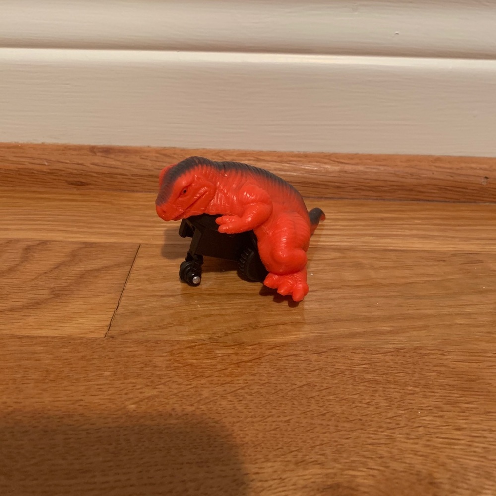 Dinosaur rolling toy